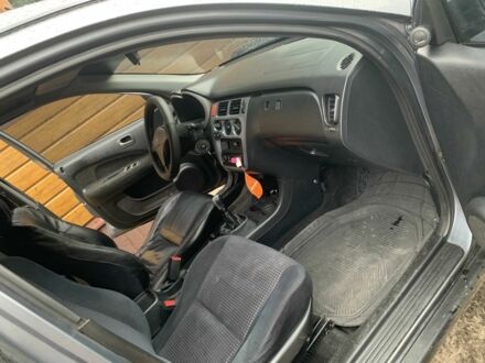 Серый Рено 10, объемом двигателя 1.6 л и пробегом 450 тыс. км за 5300 $, фото 1 на Automoto.ua