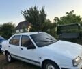Белый Рено 19, объемом двигателя 1.9 л и пробегом 400 тыс. км за 499 $, фото 1 на Automoto.ua