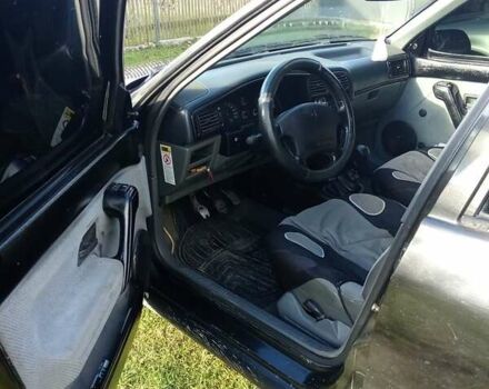 Черный Рено 19, объемом двигателя 1.8 л и пробегом 375 тыс. км за 2000 $, фото 4 на Automoto.ua