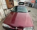 Красный Рено 19, объемом двигателя 1.7 л и пробегом 346 тыс. км за 1100 $, фото 1 на Automoto.ua