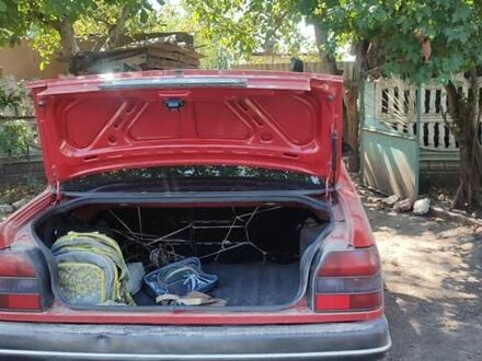 Красный Рено 19, объемом двигателя 1.9 л и пробегом 200 тыс. км за 1100 $, фото 1 на Automoto.ua