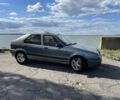 Серый Рено 19, объемом двигателя 1.9 л и пробегом 500 тыс. км за 1200 $, фото 1 на Automoto.ua