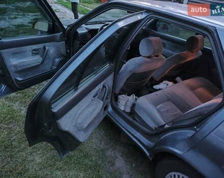 Сірий Рено 19, об'ємом двигуна 1.8 л та пробігом 300 тис. км за 799 $, фото 8 на Automoto.ua
