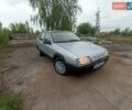 Серый Рено 19, объемом двигателя 1.87 л и пробегом 300 тыс. км за 1150 $, фото 1 на Automoto.ua