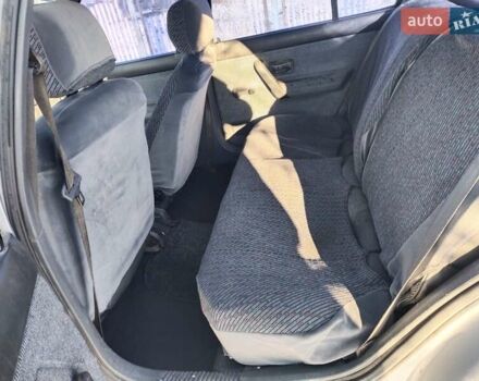 Серый Рено 19, объемом двигателя 1.39 л и пробегом 350 тыс. км за 650 $, фото 11 на Automoto.ua