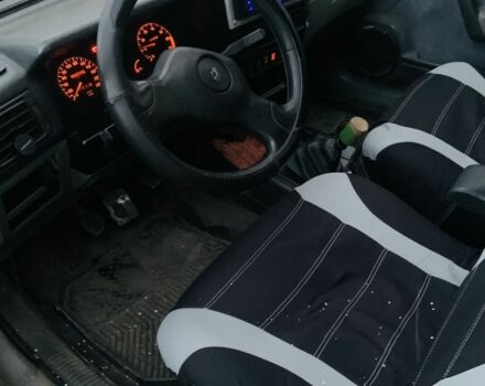 Сірий Рено 19, об'ємом двигуна 1.7 л та пробігом 370 тис. км за 600 $, фото 5 на Automoto.ua