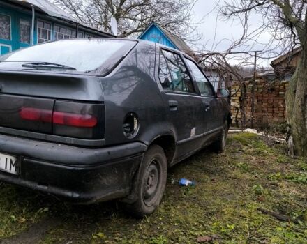 Серый Рено 19, объемом двигателя 1.4 л и пробегом 300 тыс. км за 303 $, фото 3 на Automoto.ua