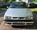 Серый Рено 19, объемом двигателя 1.8 л и пробегом 300 тыс. км за 402 $, фото 1 на Automoto.ua