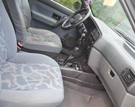 Серый Рено 19, объемом двигателя 1.8 л и пробегом 200 тыс. км за 848 $, фото 4 на Automoto.ua