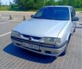 Серый Рено 19, объемом двигателя 1.6 л и пробегом 350 тыс. км за 450 $, фото 1 на Automoto.ua