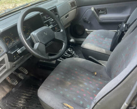 Серый Рено 19, объемом двигателя 1.4 л и пробегом 230 тыс. км за 500 $, фото 11 на Automoto.ua