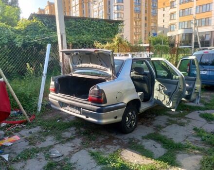 Серый Рено 19, объемом двигателя 1.4 л и пробегом 398 тыс. км за 1200 $, фото 6 на Automoto.ua