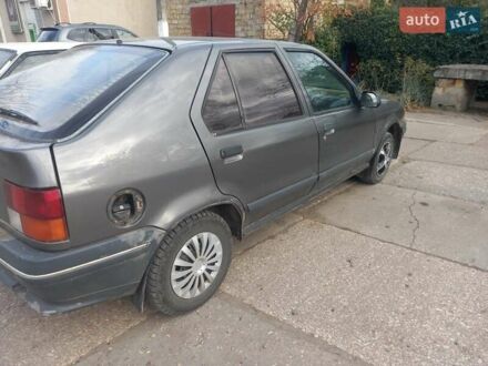 Серый Рено 19, объемом двигателя 1.3 л и пробегом 333 тыс. км за 600 $, фото 1 на Automoto.ua
