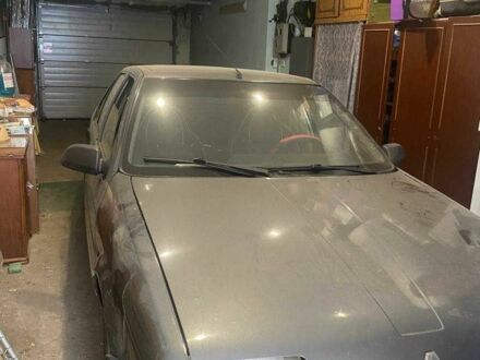 Серый Рено 19, объемом двигателя 1.6 л и пробегом 227 тыс. км за 600 $, фото 1 на Automoto.ua