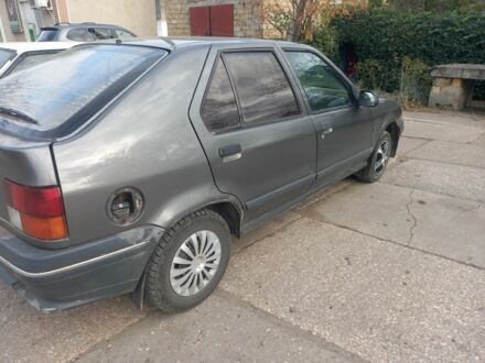 Серый Рено 19, объемом двигателя 1.67 л и пробегом 328 тыс. км за 600 $, фото 1 на Automoto.ua