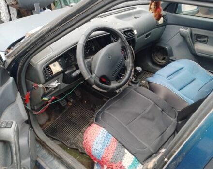 Синий Рено 19, объемом двигателя 1 л и пробегом 45 тыс. км за 359 $, фото 4 на Automoto.ua