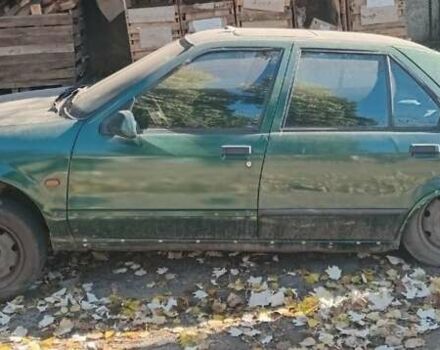 Зеленый Рено 19, объемом двигателя 1.7 л и пробегом 264 тыс. км за 800 $, фото 1 на Automoto.ua