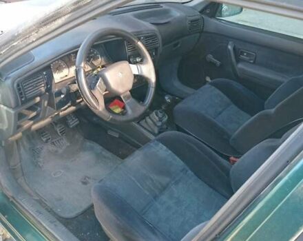 Зеленый Рено 19, объемом двигателя 1.7 л и пробегом 264 тыс. км за 800 $, фото 5 на Automoto.ua
