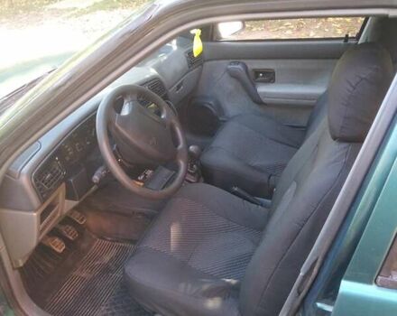 Зеленый Рено 19, объемом двигателя 1.4 л и пробегом 198 тыс. км за 2550 $, фото 5 на Automoto.ua