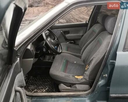 Зеленый Рено 19, объемом двигателя 1.4 л и пробегом 300 тыс. км за 500 $, фото 8 на Automoto.ua