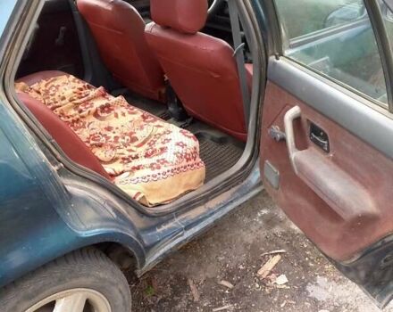 Зеленый Рено 19, объемом двигателя 1.39 л и пробегом 202 тыс. км за 1200 $, фото 1 на Automoto.ua