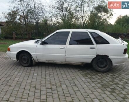 Белый Рено 21, объемом двигателя 1.7 л и пробегом 333 тыс. км за 450 $, фото 1 на Automoto.ua