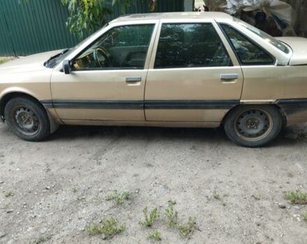 Сірий Рено 21, об'ємом двигуна 2 л та пробігом 200 тис. км за 596 $, фото 1 на Automoto.ua