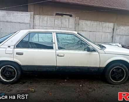 Белый Рено 25, объемом двигателя 2 л и пробегом 222 тыс. км за 600 $, фото 1 на Automoto.ua