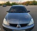 Серый Рено 9, объемом двигателя 1.6 л и пробегом 174 тыс. км за 5799 $, фото 1 на Automoto.ua