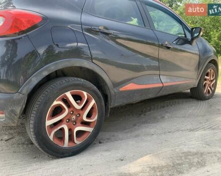 Черный Рено Каптур, объемом двигателя 1.2 л и пробегом 126 тыс. км за 9700 $, фото 2 на Automoto.ua