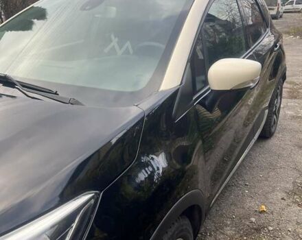 Черный Рено Каптур, объемом двигателя 1.2 л и пробегом 54 тыс. км за 12300 $, фото 2 на Automoto.ua