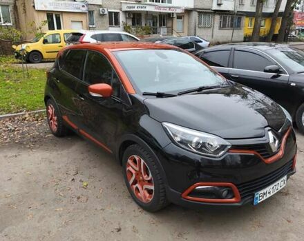 Черный Рено Каптур, объемом двигателя 1.2 л и пробегом 124 тыс. км за 13500 $, фото 2 на Automoto.ua
