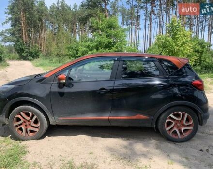 Черный Рено Каптур, объемом двигателя 1.2 л и пробегом 126 тыс. км за 9700 $, фото 1 на Automoto.ua