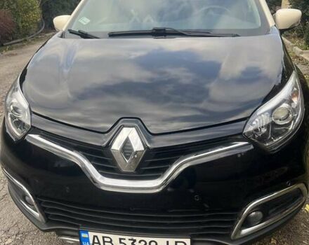 Черный Рено Каптур, объемом двигателя 1.2 л и пробегом 54 тыс. км за 12300 $, фото 1 на Automoto.ua