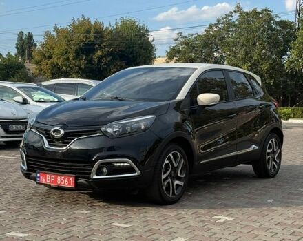 Черный Рено Каптур, объемом двигателя 1.46 л и пробегом 83 тыс. км за 11600 $, фото 1 на Automoto.ua