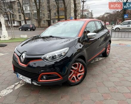 Черный Рено Каптур, объемом двигателя 1.2 л и пробегом 144 тыс. км за 10650 $, фото 1 на Automoto.ua