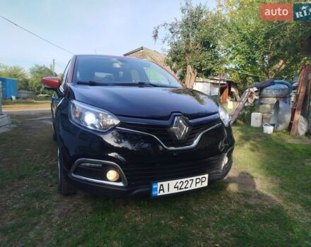 Черный Рено Каптур, объемом двигателя 1.2 л и пробегом 140 тыс. км за 10500 $, фото 1 на Automoto.ua