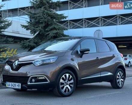 Коричневый Рено Каптур, объемом двигателя 1.2 л и пробегом 29 тыс. км за 12800 $, фото 1 на Automoto.ua