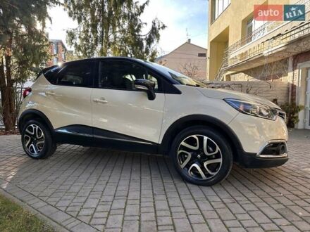 Желтый Рено Каптур, объемом двигателя 1.5 л и пробегом 140 тыс. км за 11500 $, фото 1 на Automoto.ua