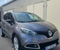 Серый Рено Каптур, объемом двигателя 1.46 л и пробегом 250 тыс. км за 10500 $, фото 1 на Automoto.ua