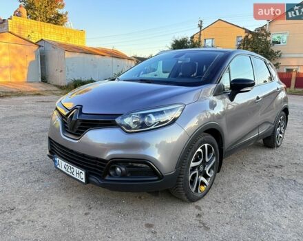 Серый Рено Каптур, объемом двигателя 1.2 л и пробегом 143 тыс. км за 12300 $, фото 1 на Automoto.ua