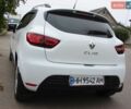 Белый Рено Клио, объемом двигателя 1.5 л и пробегом 360 тыс. км за 9500 $, фото 6 на Automoto.ua