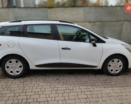 Белый Рено Клио, объемом двигателя 1.5 л и пробегом 259 тыс. км за 7400 $, фото 18 на Automoto.ua