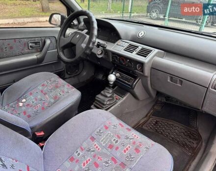 Черный Рено Клио, объемом двигателя 1.2 л и пробегом 250 тыс. км за 850 $, фото 8 на Automoto.ua