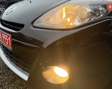 Черный Рено Клио, объемом двигателя 1.2 л и пробегом 240 тыс. км за 5750 $, фото 18 на Automoto.ua