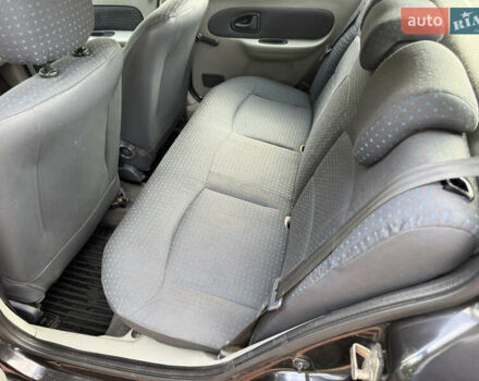 Черный Рено Клио, объемом двигателя 1.4 л и пробегом 210 тыс. км за 3999 $, фото 42 на Automoto.ua