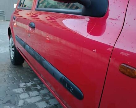 Красный Рено Клио, объемом двигателя 1.2 л и пробегом 203 тыс. км за 3500 $, фото 24 на Automoto.ua