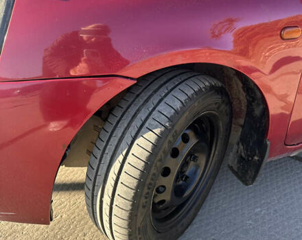 Червоний Рено Кліо, об'ємом двигуна 1.39 л та пробігом 141 тис. км за 3650 $, фото 6 на Automoto.ua