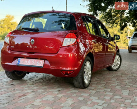 Красный Рено Клио, объемом двигателя 1.2 л и пробегом 209 тыс. км за 6900 $, фото 13 на Automoto.ua