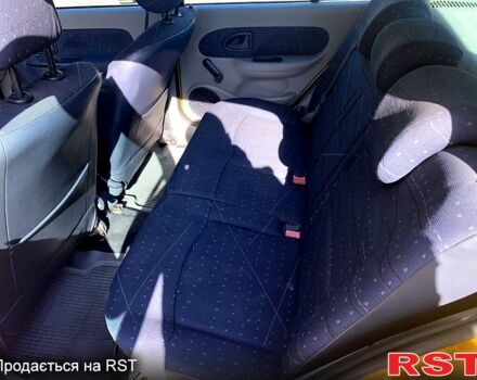 Желтый Рено Клио, объемом двигателя 1.4 л и пробегом 173 тыс. км за 3350 $, фото 5 на Automoto.ua